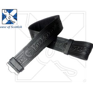 May include: Black leather belt with a Celtic knot design. The belt is 1.5 inches wide and has a buckle.