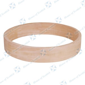 May include: A natural wood hoop ring, perfect for crafting projects.