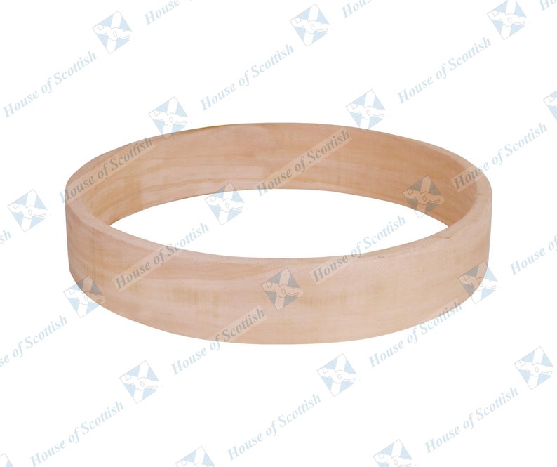 May include: A natural wood hoop ring, perfect for crafting projects.