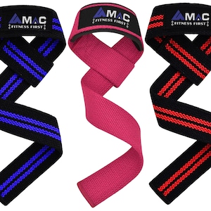May include: Three pairs of lifting straps with black fabric and coloured stripes. The straps are black with blue stripes, black with red stripes, and black with pink stripes. Each strap has the text "AMAC FITNESS FIRST" printed on it.