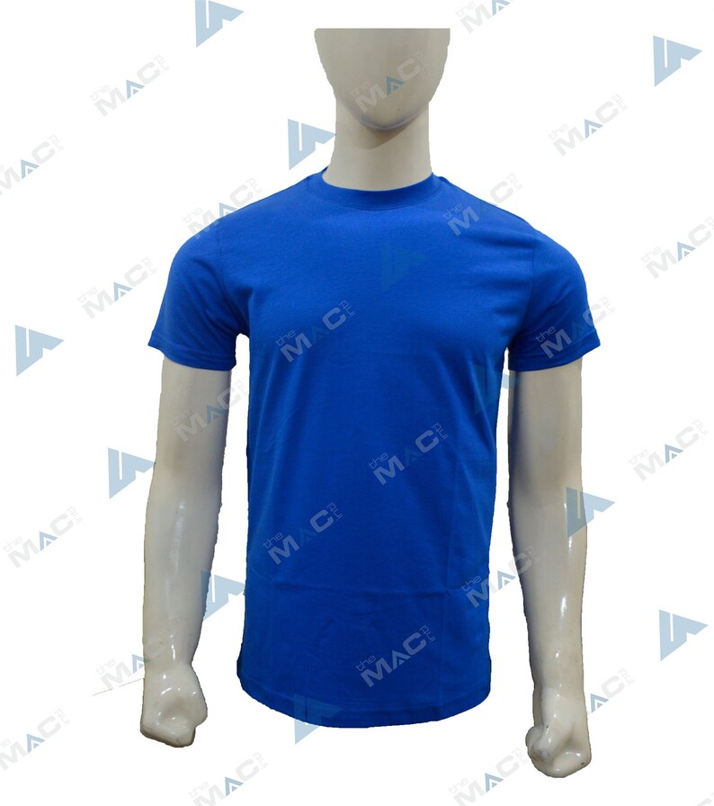 May include: A royal blue crew neck t-shirt displayed on a mannequin. The short-sleeved shirt is made of a smooth fabric. The text "the MAC" is printed on the shirt. The mannequin is set against a white background.