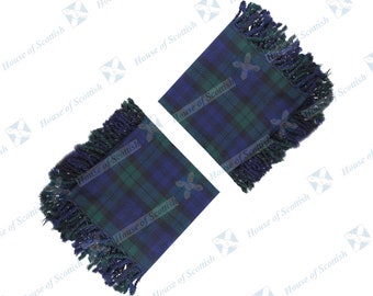May include: Two blue and green plaid fabric squares with fringed edges.
