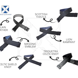 May include: A selection of black leather belts with different embossed designs, including a plain leather belt, a belt with a Scottish thistle design, a belt with a Masonic emblem, a belt with a triquetra Celtic knot design, a belt with a Celtic shield knot design, and a belt with a lion rampant design.