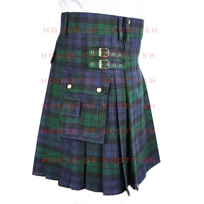 May include: A green and blue tartan kilt with a large cargo pocket and two buckles on the front. The kilt is pleated and has a traditional design.