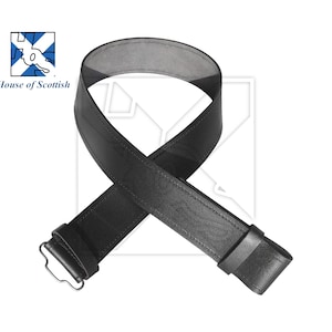 May include: A black leather belt with a buckle. The belt is folded in half and the buckle is visible.