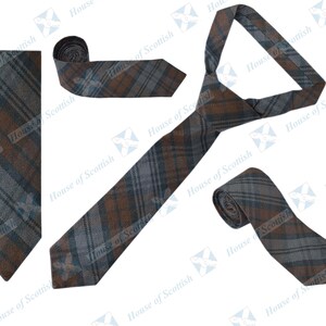 May include: Three brown and blue plaid ties. The ties are made of a woven fabric and have a classic design.
