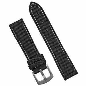 Puede incluir: Correa de reloj negra con costuras blancas y hebilla plateada.