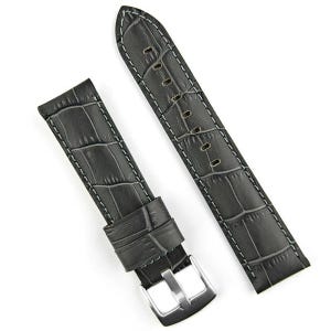May include: A pair of dark gray watch straps with a crocodile skin texture. The straps are stitched with white thread and have a silver-colored buckle. The watch straps are approximately 8 inches long.