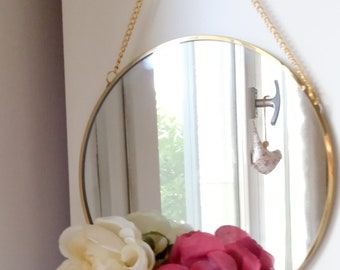 Miroir rond avec fleurs