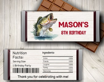 May include: A chocolate bar wrapper with a fishing theme. The wrapper is white with a brown woodgrain pattern. It features a cartoon bass jumping out of the water. The text "MASON'S 8TH BIRTHDAY" is printed in red on the wrapper. The back of the wrapper has a nutrition facts label and a list of ingredients.