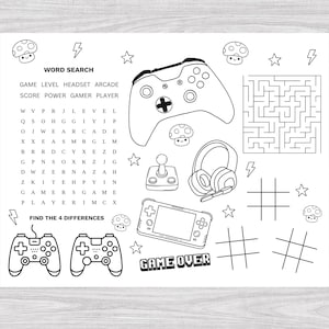 May include: Black and white activity sheet featuring gaming-themed illustrations. Includes a word search, maze, tic-tac-toe grids, and game controllers. The text "GAME OVER" is also present.