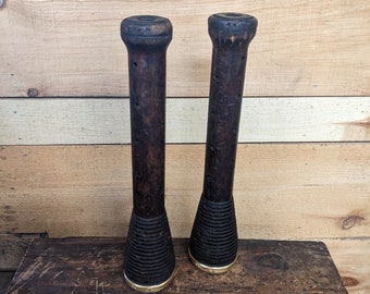 Pair of frame bobbins from old woolen mill with brass binding 12 inches tall