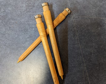 Writing Pen made from Shuttle Spindle, 7" Long wood tone.