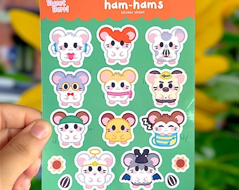 Op de afbeelding: Een stickerblad met 10 verschillende hamsterontwerpen. Het blad is groen met witte randen rond elke sticker. Het blad heeft de tekst "ham-hams sticker sheet" bovenaan.