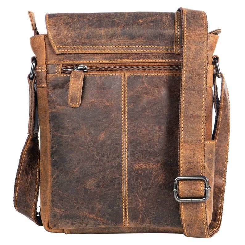 May include: A brown leather messenger bag with a long adjustable strap and a zippered pocket on the front.