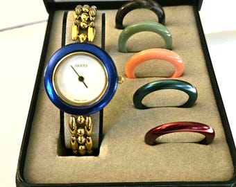 Authentic 18k Gold Plated Gucci Bezel Watch in Excellent Condition with a Rice Link Bracelet and 6 Like New Bezels.PLEASE READ DESCRIPTION!
