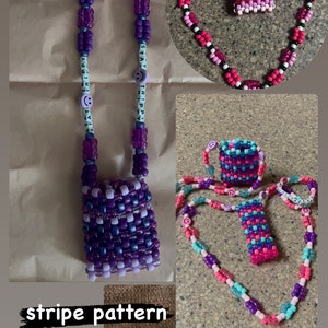 May include: A selection of handmade beaded accessories, including a small purple and blue beaded purse with a matching strap, and several necklaces and bracelets. The accessories feature smiley face beads and the words "STAY TRIPPY". The image also shows three small beaded containers.