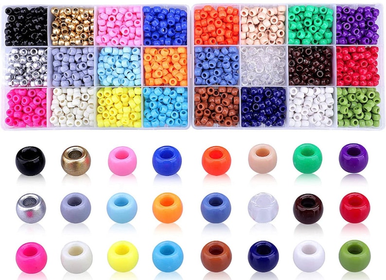 May include: A selection of colourful beads in various sizes and shapes. The top section features small, square beads in a variety of colours, including black, gold, pink, and blue. The bottom section displays larger, round beads in a range of colours.