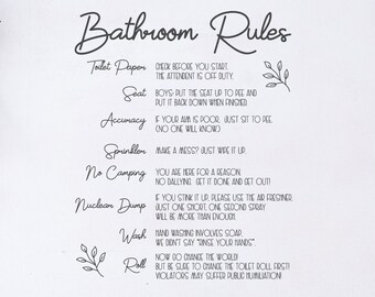 May include: A white sign with black text that reads "Bathroom Rules." The sign lists rules for toilet paper, seat, accuracy, sprinkler, no camping, nuclear dump, wash, and roll. The sign also includes the text "SVG | DXF | EPS | PNG Commercial free cut file."