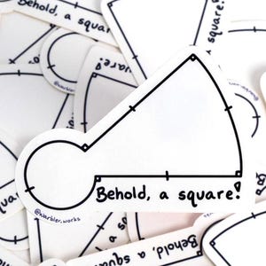 May include: A collection of white stickers with black outlines and the phrase "Behold, a square!". The stickers feature geometric shapes, including a square with a curved side and a circle. The stickers are a fun, artistic design.