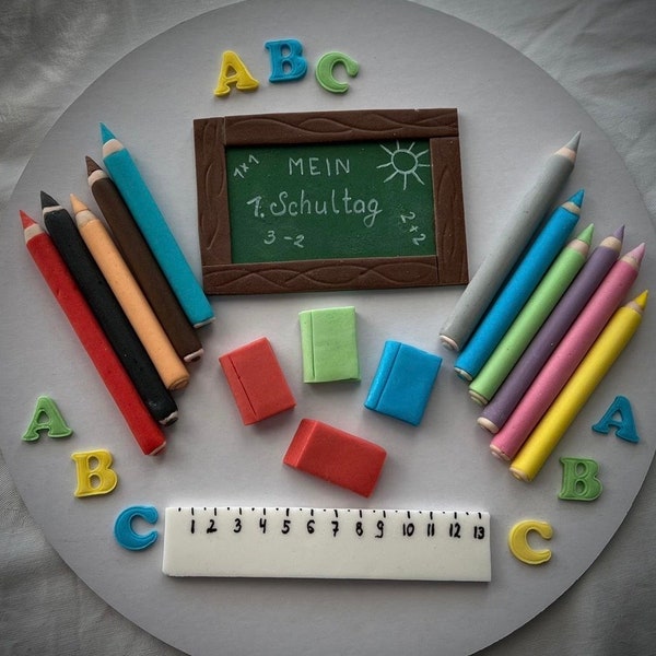 Cake decoration for school enrollment. Pencils. Made from fondant. School enrollment cake. 1st day of school