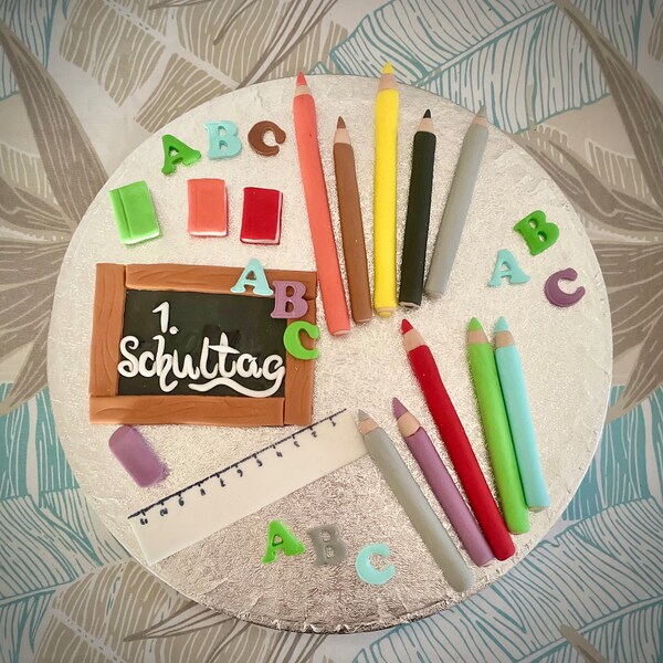 Cake decoration for school enrollment. Pencils. Made from fondant. School enrollment cake. 1st day of school