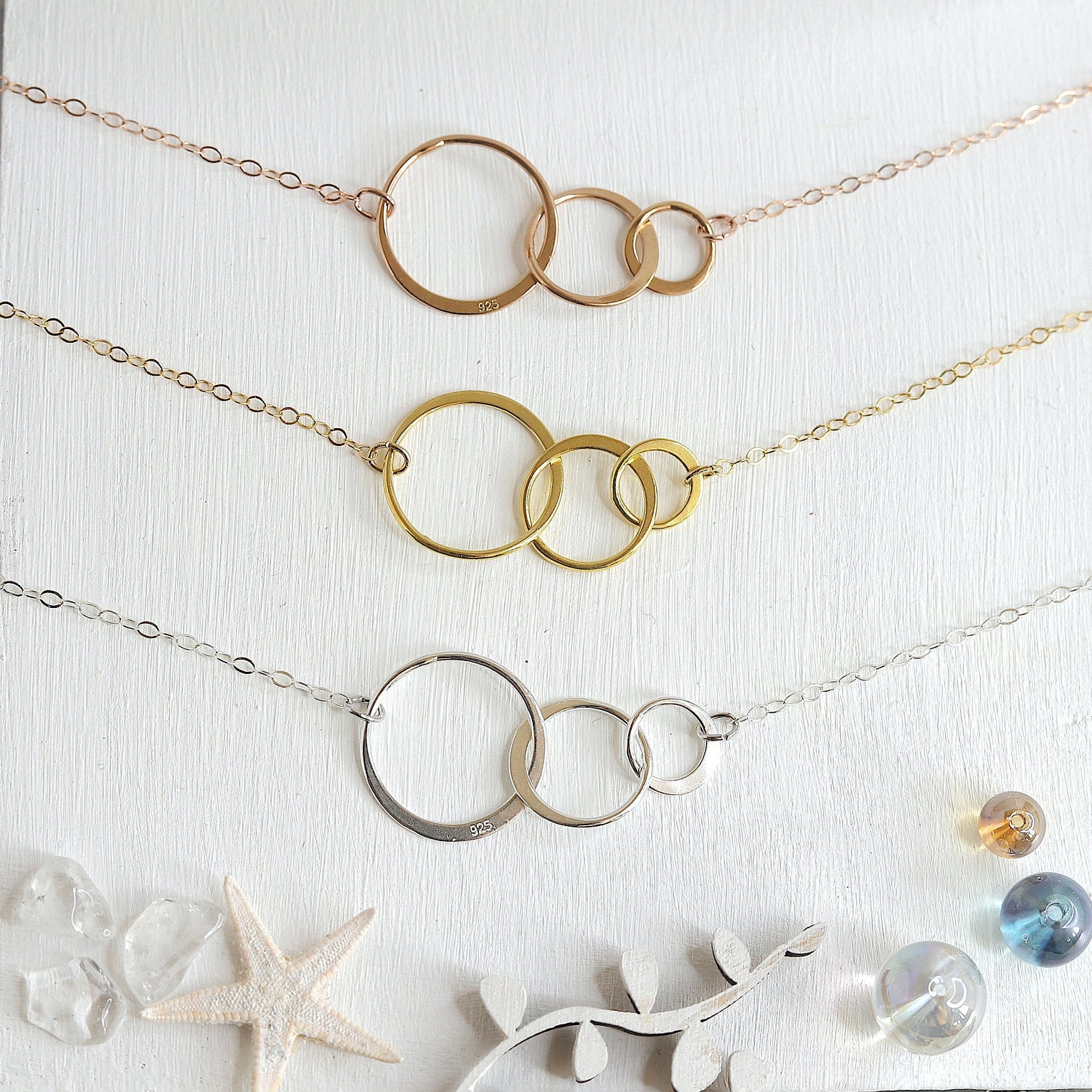 3 interlocking circle necklace meaning outlet