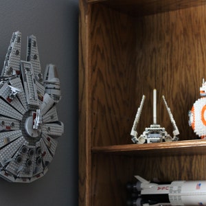 Ultimate Display Solutions wall mount display for Lego 7965, 75105, and 75212 Millennium Falcon/Kessel Run Falcon