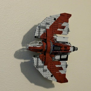 Ultimate Display Solutions wall mount display for Lego 75362 Ahsoka Tano's T-6 Jedi Shuttle in flight