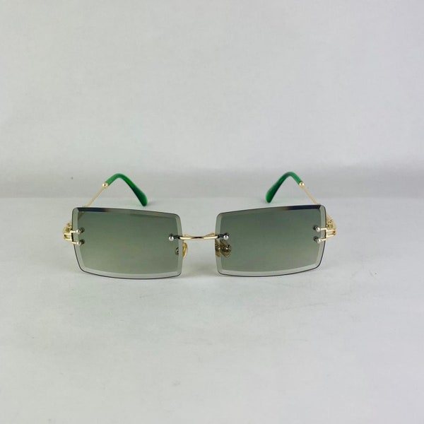 Awesome rimless square green lens and gold metal frame with green ear piece sunglasses.