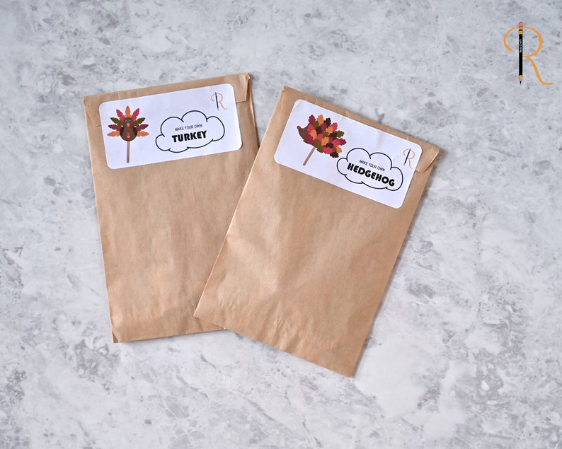 May include: Two brown paper bags with white labels. The labels have images of a turkey and a hedgehog with the text "Make your own TURKEY" and "Make your own HEDGEHOG".