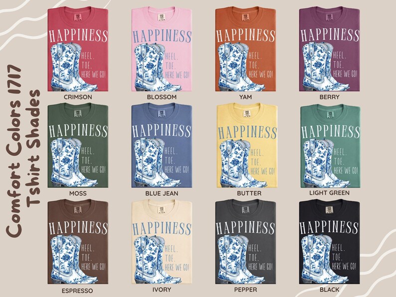 May include: A selection of Comfort Colors 1717 T-shirts in a range of colours, each displaying a blue and white floral cowboy boot graphic and the word "HAPPINESS". The text "HEEL TOE HERE WE GO" is also printed on the shirts.