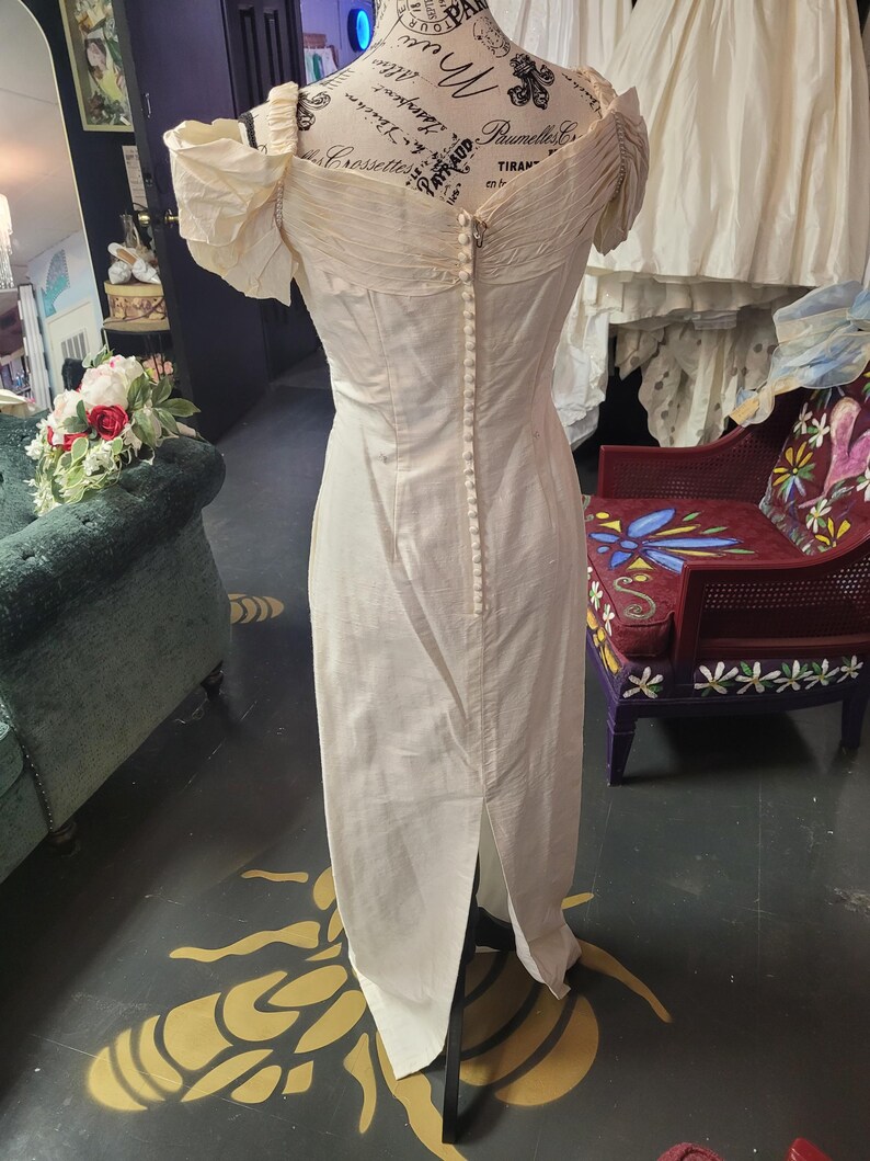 Sweet vintage 100 percent silk bridal gown with detachable train, darling rosettes & a pearl neckline. Sample size 8. Never been worn. image 18