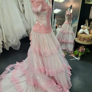 Vintage Alfred Angelo Wedding Gown. Custom dyed pink and waiting for someone who appreciates what a great find this is. Sample size 6.