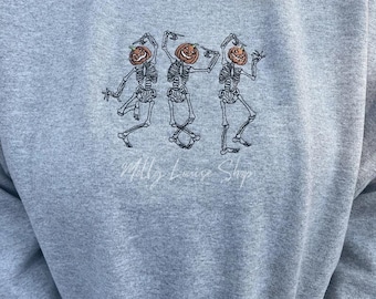 Dansende skeletten geborduurd sweatshirt