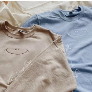 Smiley Face Embroidered Sweatshirt