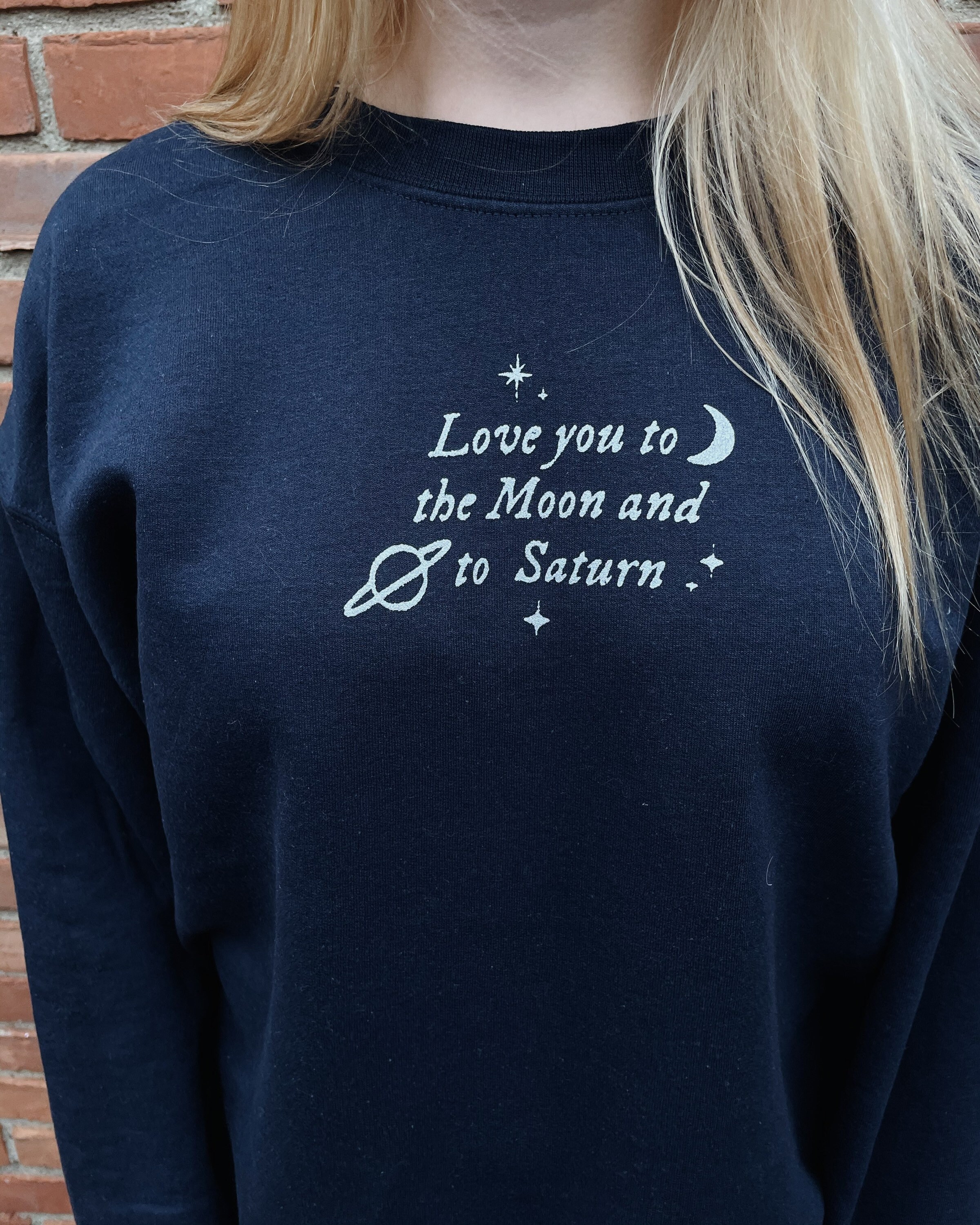 saturn sweater