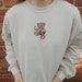 Charmingly Brunette Teddy Bear Bow Sweater