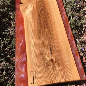 Charcuterie board, cutting board, serving tray.
