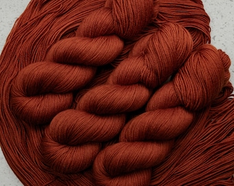 Auburn-115g Superwash Merino Sock Yarn, 80/20 merino/nylon, 420 yards- Hand dyed in Alberta Canada- semi solid deep rust/orange