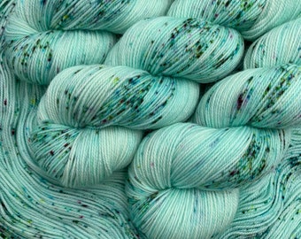 Water Nymph- 115g Superwash Merino Sock Yarn- 80/20 merino/nylon, 420 yards- hand dyed - aqua base with green, magenta & yellow speckles