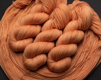 Eat a Peach-115g Superwash Merino Sock Yarn, 80/20 merino/nylon, 420 yards- Hand dyed in Alberta Canada- semi solid peach