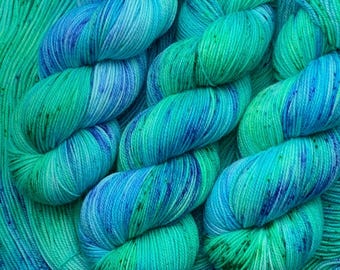 Aquatic- Hand Dyed Superwash Merino Sock Yarn, 115g: 80/20 Merino/nylon, 418 yards. Aqua, green, blue, speckled