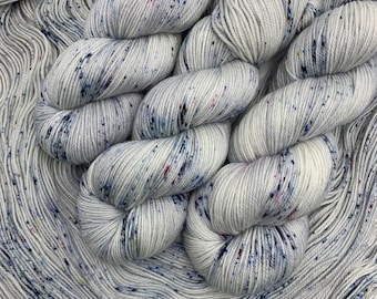 Frost Warning- 115g Superwash Merino Sock Yarn- 80/20 merino/nylon, 420 yards- hand dyed - silver base with blue, red & yellow speckles