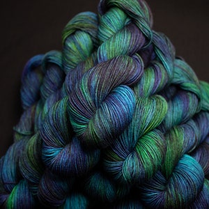 Random Attraction- Dk or Worsted.  100% Merino Superwash, 115g skein.  Hand dyed in Alberta Canada, ready to ship.