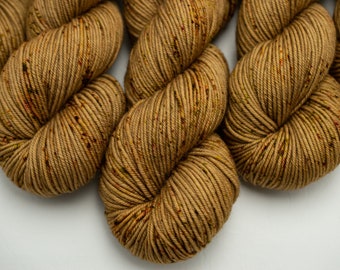 Gingerbread Cookie- 115g Superwash, 100% Merino Dk (280 yards) OR Worsted- (210 yards) Hand dyed in Alberta Canada, speckled