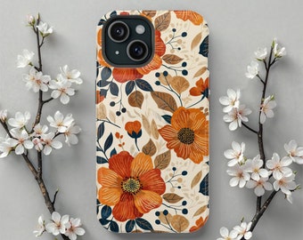 May include: A rectangular smartphone case featuring a repeating pattern of large orange flowers, dark blue leaves, and tan foliage on a cream background. The case has a black camera cutout at the top left corner, showcasing a dual-lens camera system.