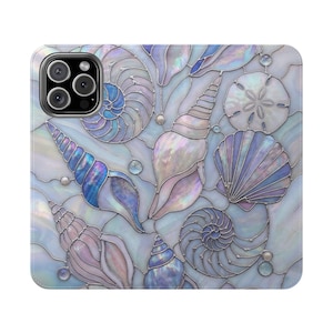 May include: A phone case featuring a stained-glass design of seashells in shades of blue, purple, and white. The case has a pearlescent effect, with a variety of shell shapes and sizes. The case has a camera cutout on the upper left corner.