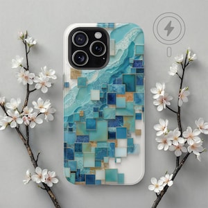 May include: A white phone case with a blue and gold geometric design. The design features squares of different sizes and shades of blue, with gold accents. The case has a cutout for the phone's camera.