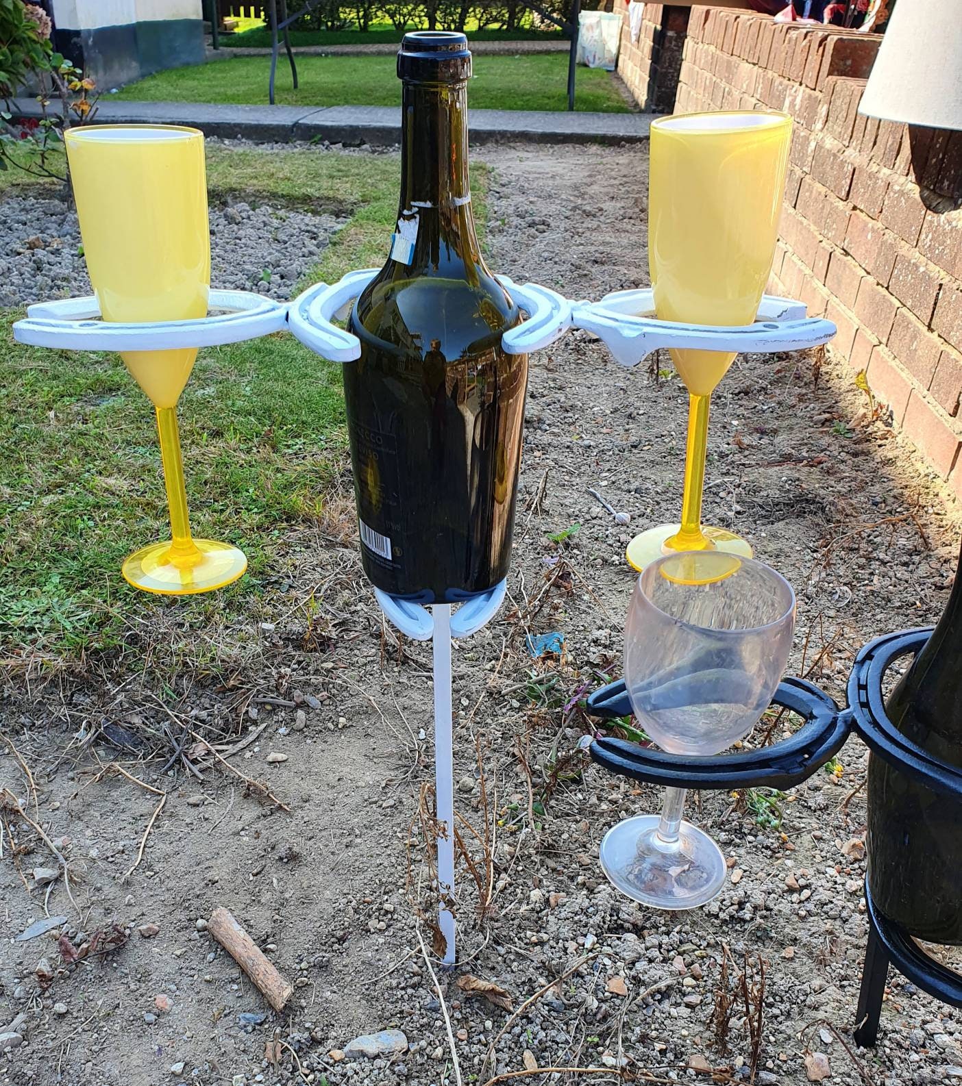 Wine bottle holder for garden sale